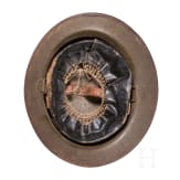 A steel helmet M 17 "Brodie" of a veteran from the27th Infantry Division, "New York Division"