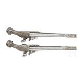 A pair of silver-mounted Balkan Turkish flintlock pistols, circa 1830