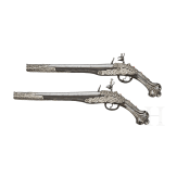 A pair of silver-mounted Balkan Turkish flintlock pistols, circa 1830