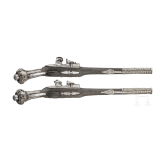 A pair of silver-mounted Balkan Turkish flintlock pistols, circa 1830
