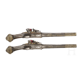 A fine pair of Ottoman silver-mounted flintlock pistols, dated 1849