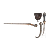 A yemenite matchlock rifle with cartridge pouch and Khoumya, 19th and 20th century