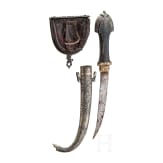 A yemenite matchlock rifle with cartridge pouch and Khoumya, 19th and 20th century