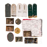 Six belt buckles and cloth insignia