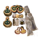 A small collection of German insignias and a compass