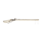A wheellock hunting rifle with richly engraved, presumably later ivory-veneered stock, Wilhelm Neubauer of Prague, circa 1690/95