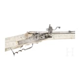 A wheellock hunting rifle with richly engraved, presumably later ivory-veneered stock, Wilhelm Neubauer of Prague, circa 1690/95