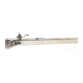 A wheellock hunting rifle with richly engraved, presumably later ivory-veneered stock, Wilhelm Neubauer of Prague, circa 1690/95