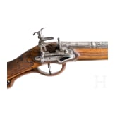 A fine silver-mounted Miquelet rifle with an Ottoman barrel, ca. 1760