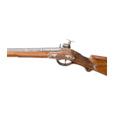 A fine silver-mounted Miquelet rifle with an Ottoman barrel, ca. 1760