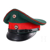 A visor cap for officers of the Jaeger battalions and some medals