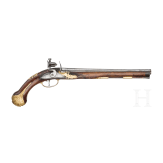 A flintlock pistol with fire-gilt mounts, circa 1720