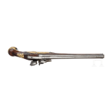A flintlock pistol with fire-gilt mounts, circa 1720