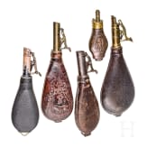 Four English shot bags and a priming powder bottle, circa 1900