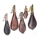 Four English shot bags and a priming powder bottle, circa 1900