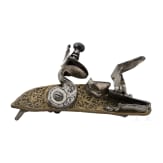 A German Flintlock with brass fittings, 18th century