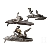 Two flintlocks and a percussion lock, 18th/19th century