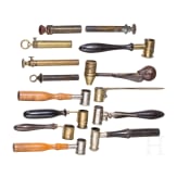 A set of fourteen English powder measures, circa 1800