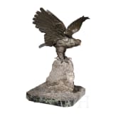 A large eagle on stone pedestal