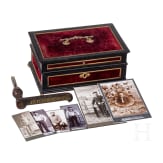 A patriotic door handle and a box with photos