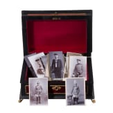 A patriotic door handle and a box with photos