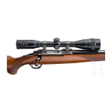 A Ruger Mod. M 77, with scope
