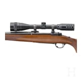 A Ruger Mod. M 77, with scope