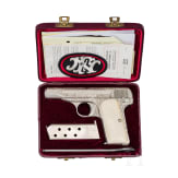 An FN Mod. 1910, factory engraved, nickel-plated, in leather case