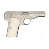 An FN Mod. 1910, factory engraved, nickel-plated, in leather case