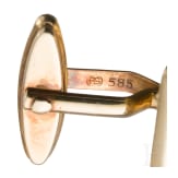 A pair of 14ct gold and lapis lazuli cufflinks