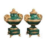 A pair of monumental malachite and ormolu-mounted vases with rams