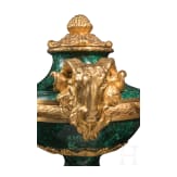A pair of monumental malachite and ormolu-mounted vases with rams