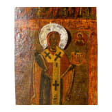 A Russian icon showing Saint Nicholas of Mozhaisk with 40 scenes of his life with silver halo, Russia, 18th century