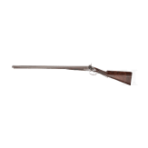 A percussion side by side shotgun by Richard Jackson, London, in case
