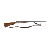 a double-barrel side.by-side shotgun CZ .16/70