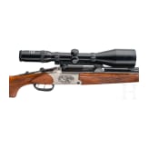 A Combination Rifle by Blaser, with scope