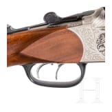 A Combination Rifle by Blaser, with scope