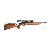 A Thompson Center Contender with receiver, stock with Tasco scope and two conversion barrels