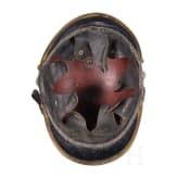 Vier Feuerwehrhelme