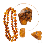 An amber necklace, an amber pendant and two amber chunks