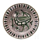 A medieval Italien earthenware plate with harpy, Orvieto (Umbria), 15th century