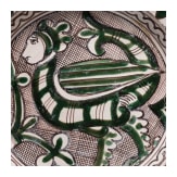 A medieval Italien earthenware plate with harpy, Orvieto (Umbria), 15th century