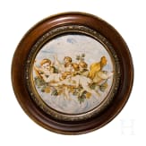 A framed Castelli Maiolica circular plate, circa 1750