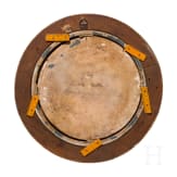 A framed Castelli Maiolica circular plate, circa 1750