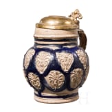 A small Westerwald stoneware jug with fire gilt lid, 17th century