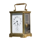 A brass carriage clock with case, probably France, 19th century