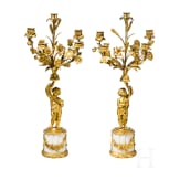 A pair of Louis XVI style five-light candelabra with putti, late 19th/early 20th century