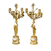 A pair of Louis XVI style five-light candelabra with putti, late 19th/early 20th century