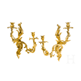 A German or French pair of fire gilt Louis XV sconces, mid-18th century
