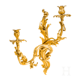 A German or French pair of fire gilt Louis XV sconces, mid-18th century